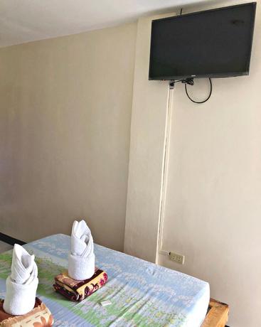 Imagen de la habitación del Hotel Famous Inn. Foto 18