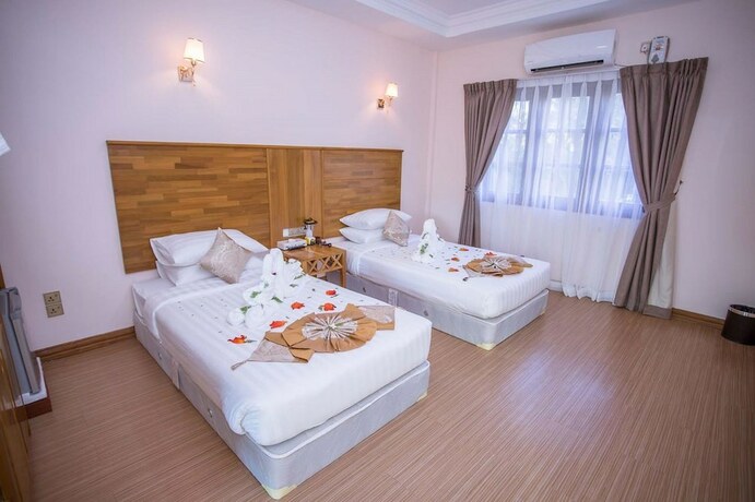 Imagen de la habitación del Hotel Famous Ngapali. Foto 10