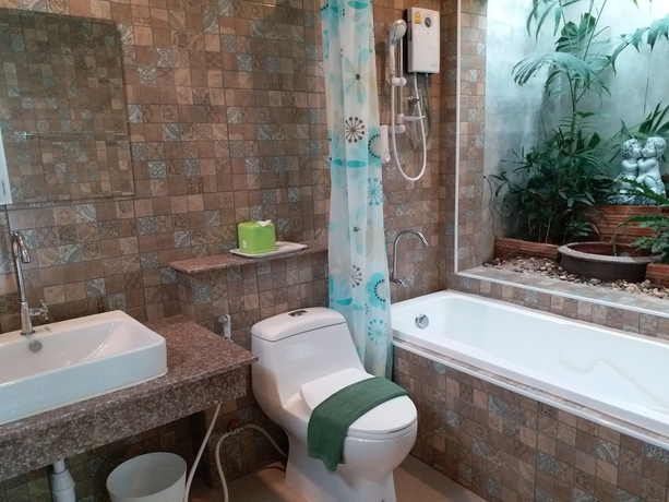 Imagen de la habitación del Hotel Fancy Carp Resort. Foto 16