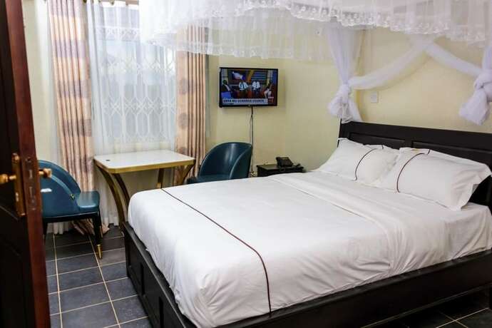 Imagen de la habitación del Hotel Fancy, Kampala. Foto 20