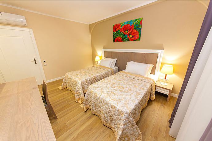 Imagen de la habitación del Hotel FandM. Foto 2