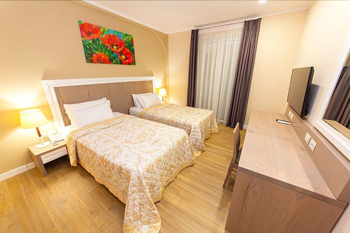 Imagen de la habitación del Hotel FandM. Foto 4