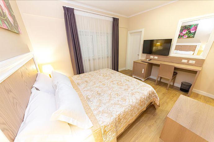 Imagen de la habitación del Hotel FandM. Foto 6