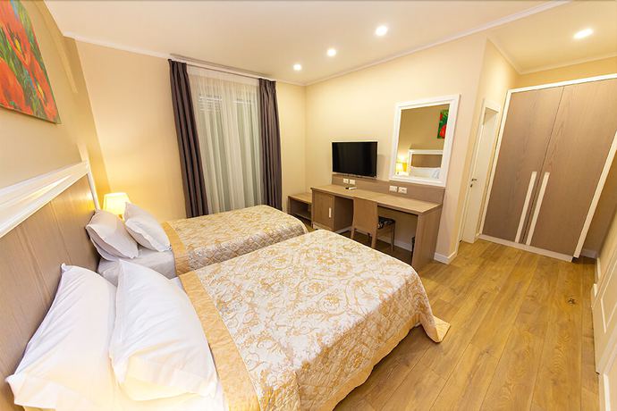 Imagen de la habitación del Hotel FandM. Foto 8