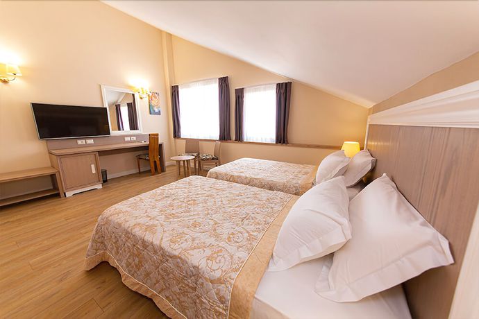 Imagen de la habitación del Hotel FandM. Foto 12