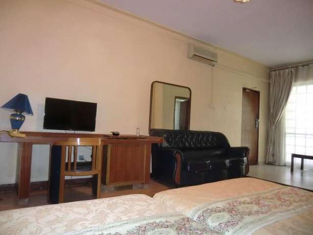 Imagen de la habitación del Hotel Fang Fang. Foto 7