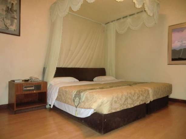 Imagen de la habitación del Hotel Fang Fang. Foto 13