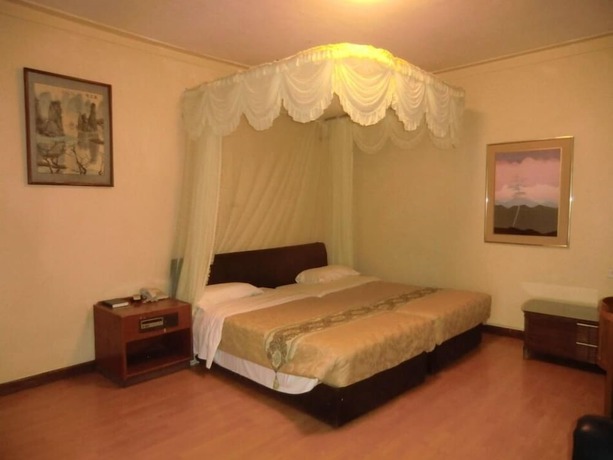 Imagen de la habitación del Hotel Fang Fang. Foto 14