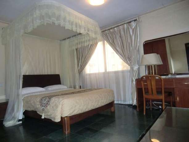 Imagen de la habitación del Hotel Fang Fang. Foto 17