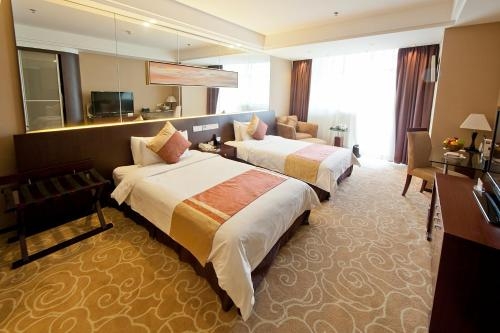 Imagen de la habitación del Hotel Fangyuan Jinling Plaza Hotel. Foto 7