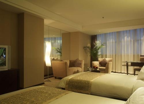Imagen de la habitación del Hotel Fangyuan Jinling Plaza Hotel. Foto 8
