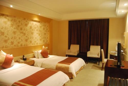 Imagen de la habitación del Hotel Fangyuan Jinling Plaza Hotel. Foto 10