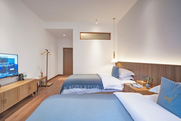 Imagen de la habitación del Hotel Fanjing Mountain Xingyi Yunshe Homestay. Foto 2