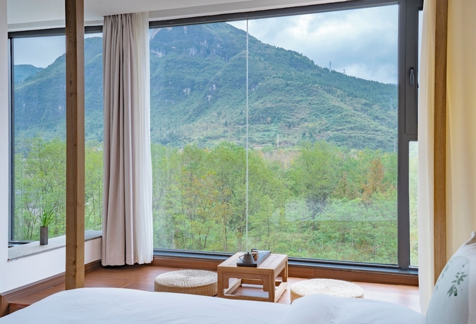Imagen de la habitación del Hotel Fanjing Mountain Xingyi Yunshe Homestay. Foto 16