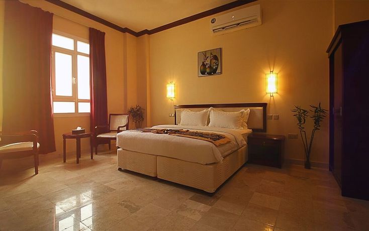 Imagen de la habitación del Hotel Farah Apartment. Foto 7