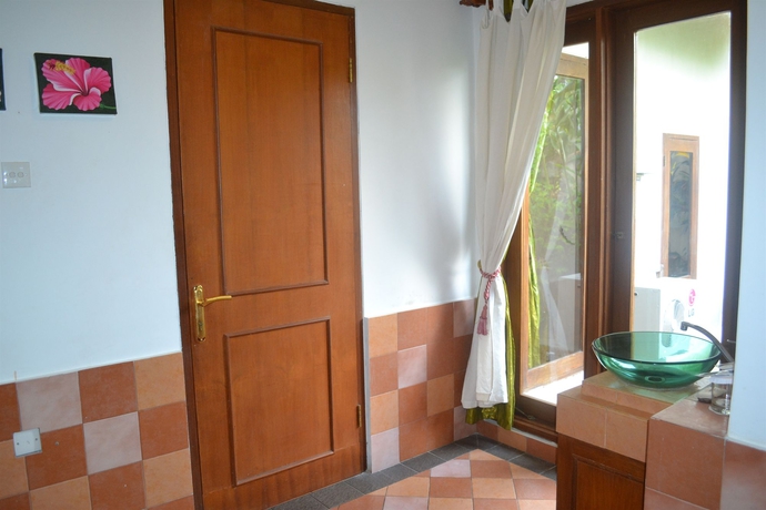 Imagen de la habitación del Hotel Fare Ti'i Villas. Foto 3