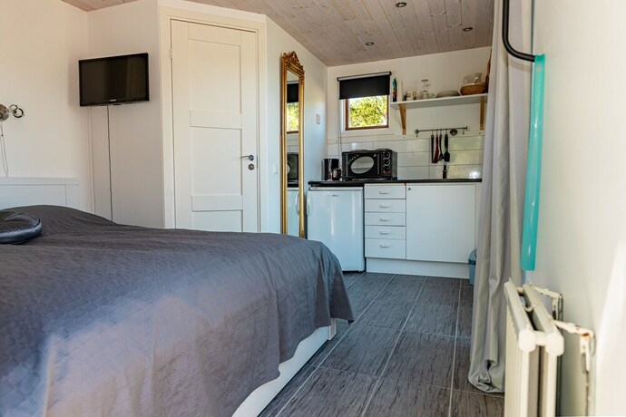Imagen de la habitación del Hotel F&aring;r&ouml;sunds Semesterby. Foto 20