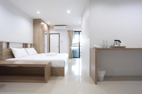 Imagen de la habitación del Hotel Farisa Garden. Foto 9