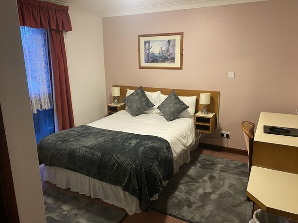 Imagen de la habitación del Hotel Farmhouse Inn. Foto 18