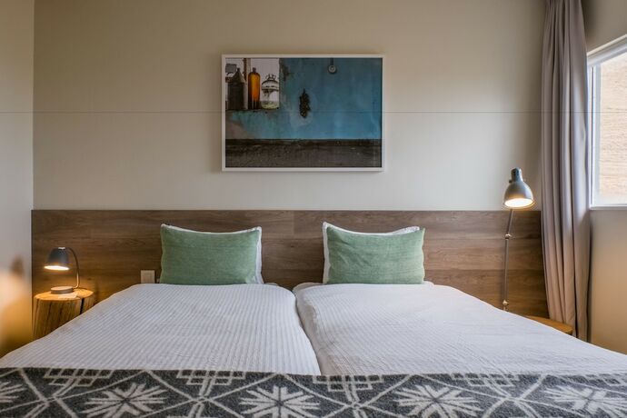 Imagen de la habitación del Hotel Farmhouse Lodge. Foto 13