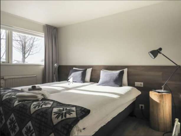 Imagen de la habitación del Hotel Farmhouse Lodge. Foto 17