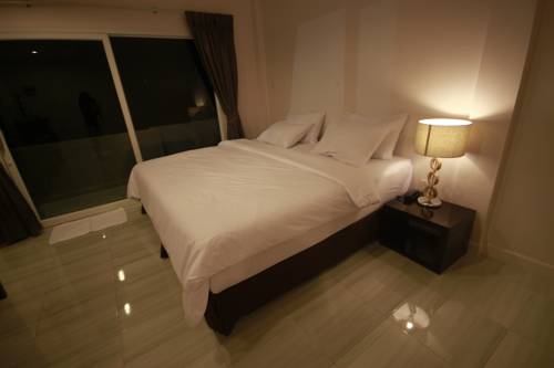 Imagen de la habitación del Hotel Farmhouse Ranong. Foto 6