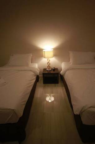 Imagen de la habitación del Hotel Farmhouse Ranong. Foto 8