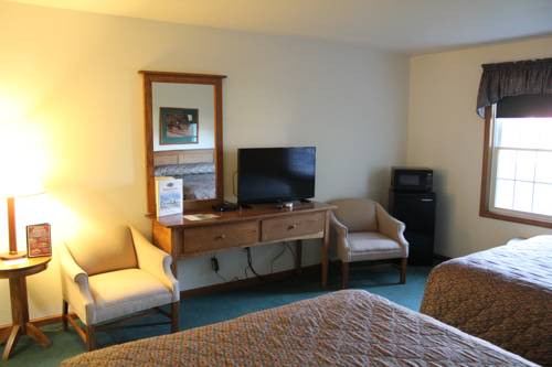 Imagen de la habitación del Hotel Farmstead Inn and Conference Center. Foto 3