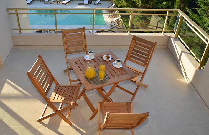 Imagen de la habitación del Hotel Farnese Apart and Spa. Foto 9