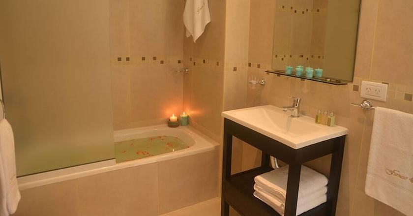 Imagen de la habitación del Hotel Farnese Apart and Spa. Foto 12