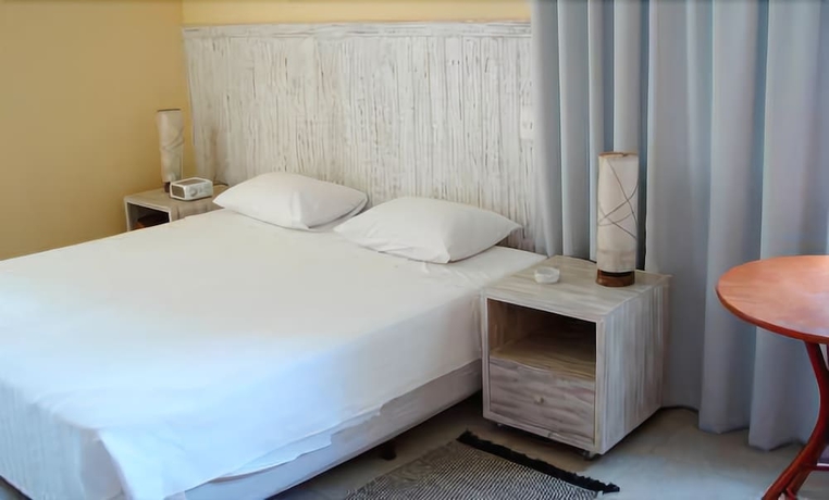 Imagen de la habitación del Hotel Farol De Itapu&atilde; Praia. Foto 4