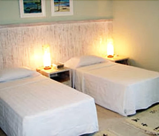 Imagen de la habitación del Hotel Farol De Itapu&atilde; Praia. Foto 9
