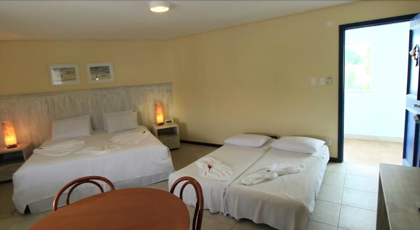 Imagen de la habitación del Hotel Farol De Itapu&atilde; Praia. Foto 10