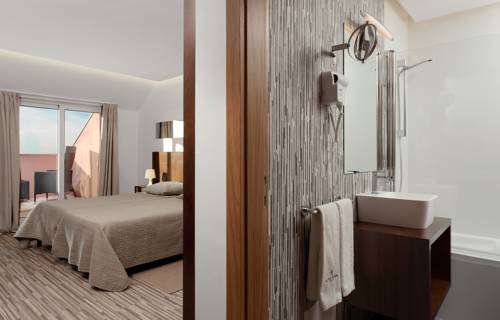 Imagen de la habitación del Hotel Farol, Praia da Barra. Foto 2