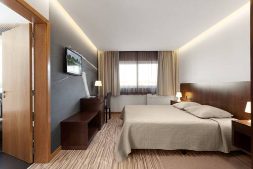 Imagen de la habitación del Hotel Farol, Praia da Barra. Foto 4