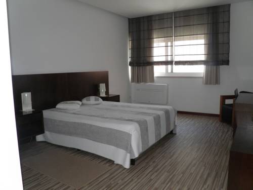 Imagen de la habitación del Hotel Farol, Praia da Barra. Foto 10