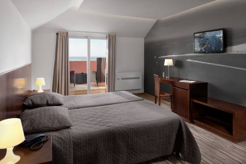 Imagen de la habitación del Hotel Farol, Praia da Barra. Foto 11