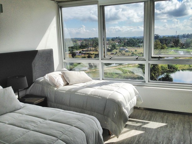 Imagen de la habitación del Hotel Faros de Carrasco Apartments. Foto 8