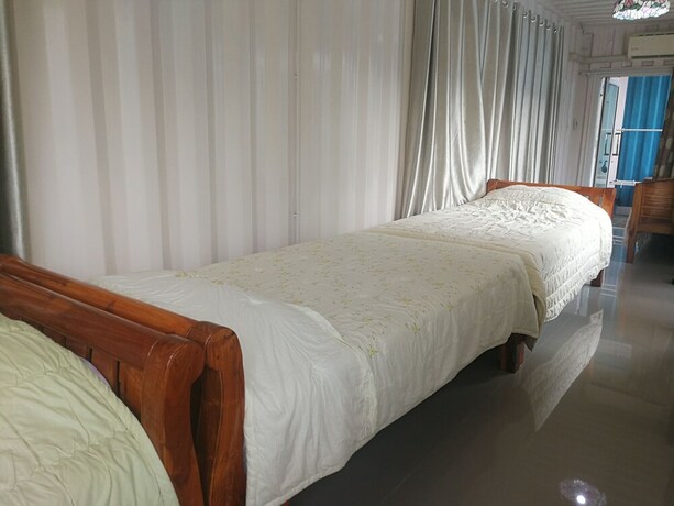 Imagen de la habitación del Hotel Farsai Homestay. Foto 3