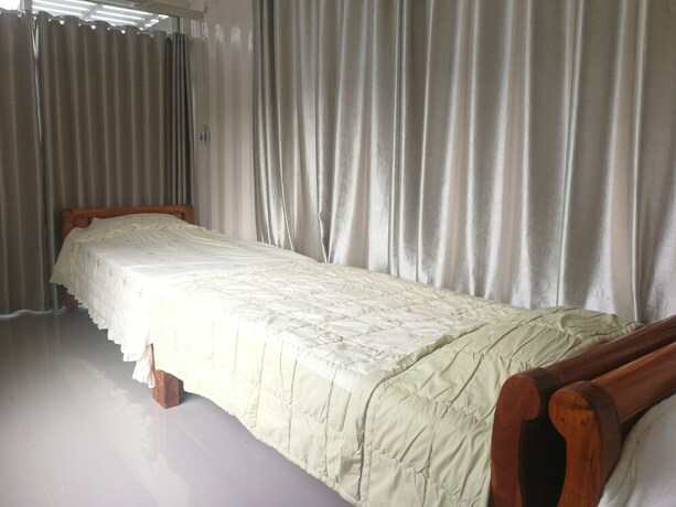 Imagen de la habitación del Hotel Farsai Homestay. Foto 5
