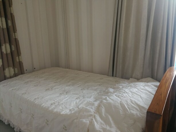 Imagen de la habitación del Hotel Farsai Homestay. Foto 6