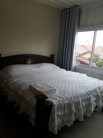 Imagen de la habitación del Hotel Farsai Homestay. Foto 7