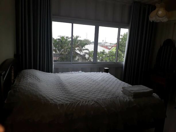Imagen de la habitación del Hotel Farsai Homestay. Foto 8