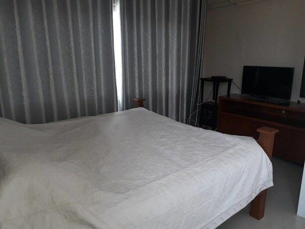 Imagen de la habitación del Hotel Farsai Homestay. Foto 9