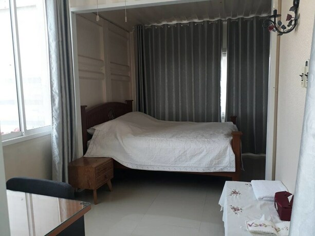 Imagen de la habitación del Hotel Farsai Homestay. Foto 10