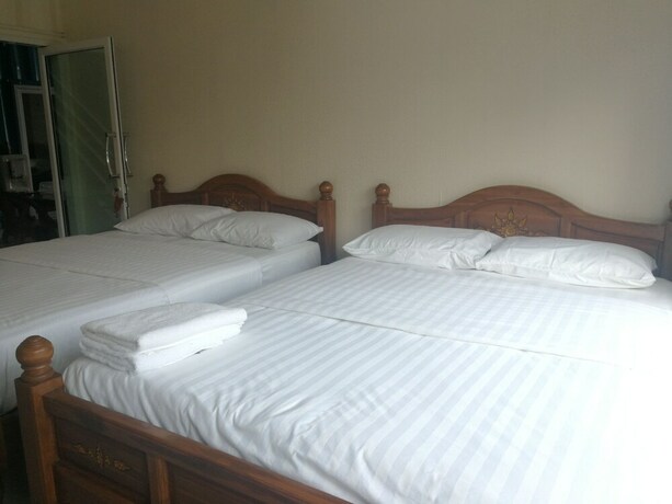 Imagen de la habitación del Hotel Farsai Homestay. Foto 11