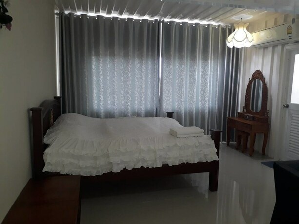 Imagen de la habitación del Hotel Farsai Homestay. Foto 12