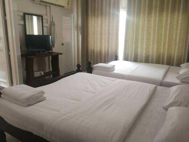 Imagen de la habitación del Hotel Farsai Homestay. Foto 14