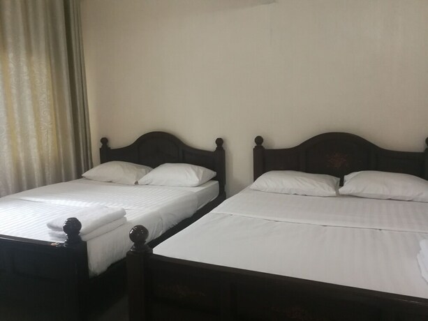 Imagen de la habitación del Hotel Farsai Homestay. Foto 15