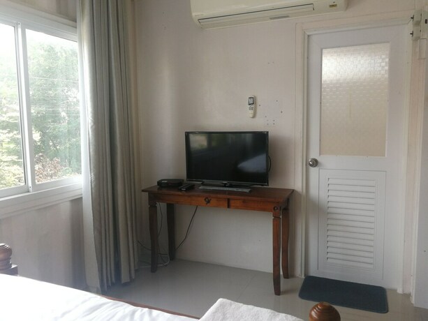 Imagen de la habitación del Hotel Farsai Homestay. Foto 17